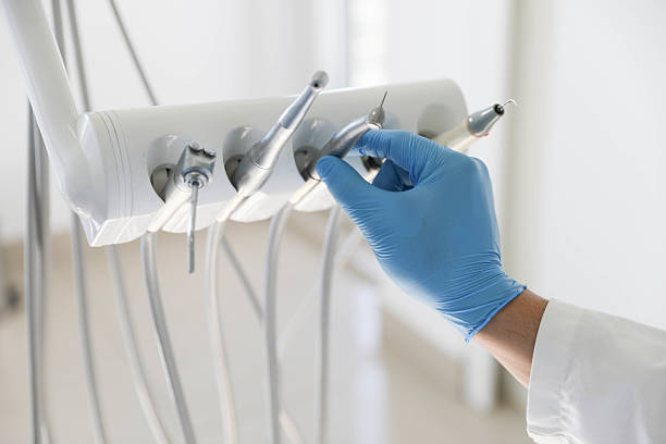 Professional Tooth Extraction technician working in Van Buren County County, AR